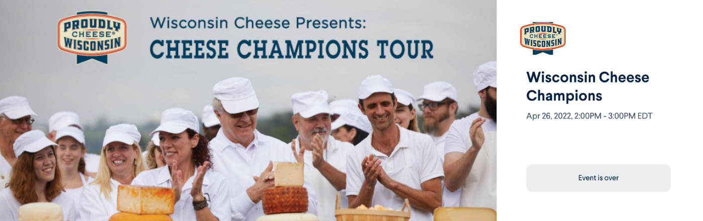 Cheese makers gathered around winning cheeses for the Cheese champions tour